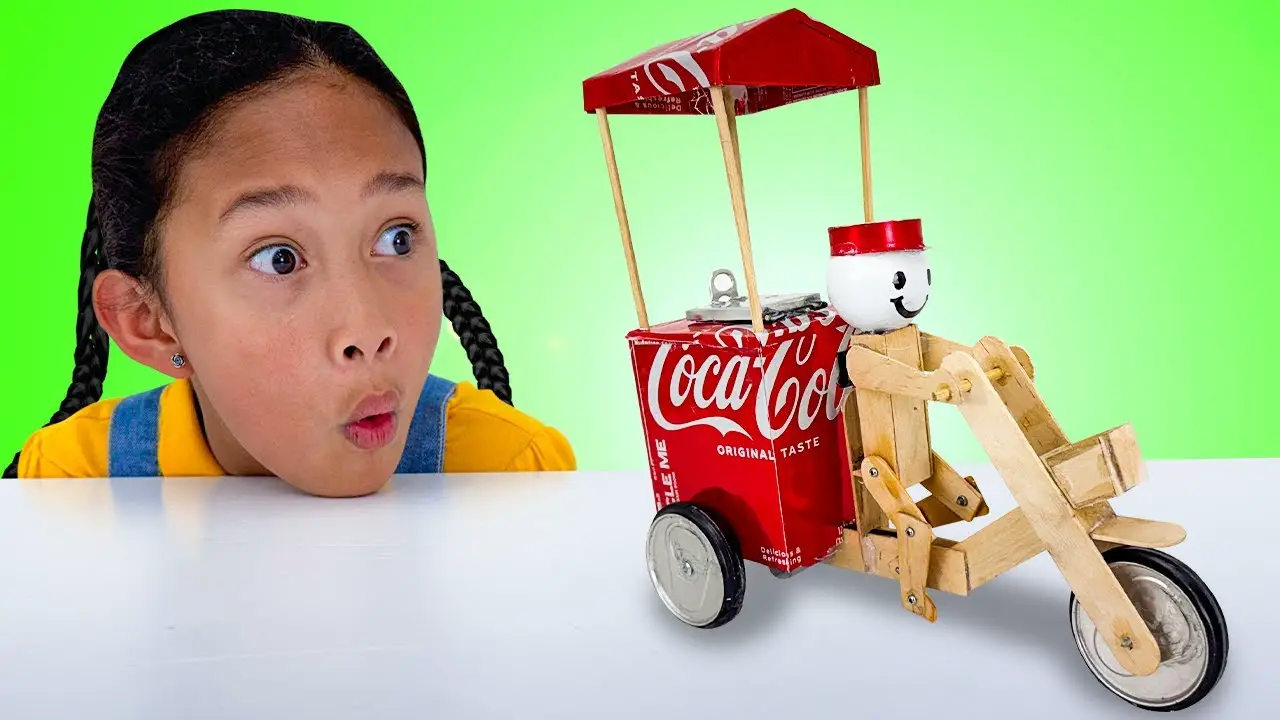 Andrea & Eva Make Recycled Cardboard Truck and Soda Can Bike!